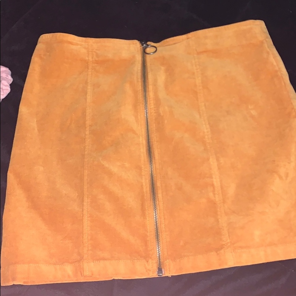 Super cute, super soft, zip up skirt.